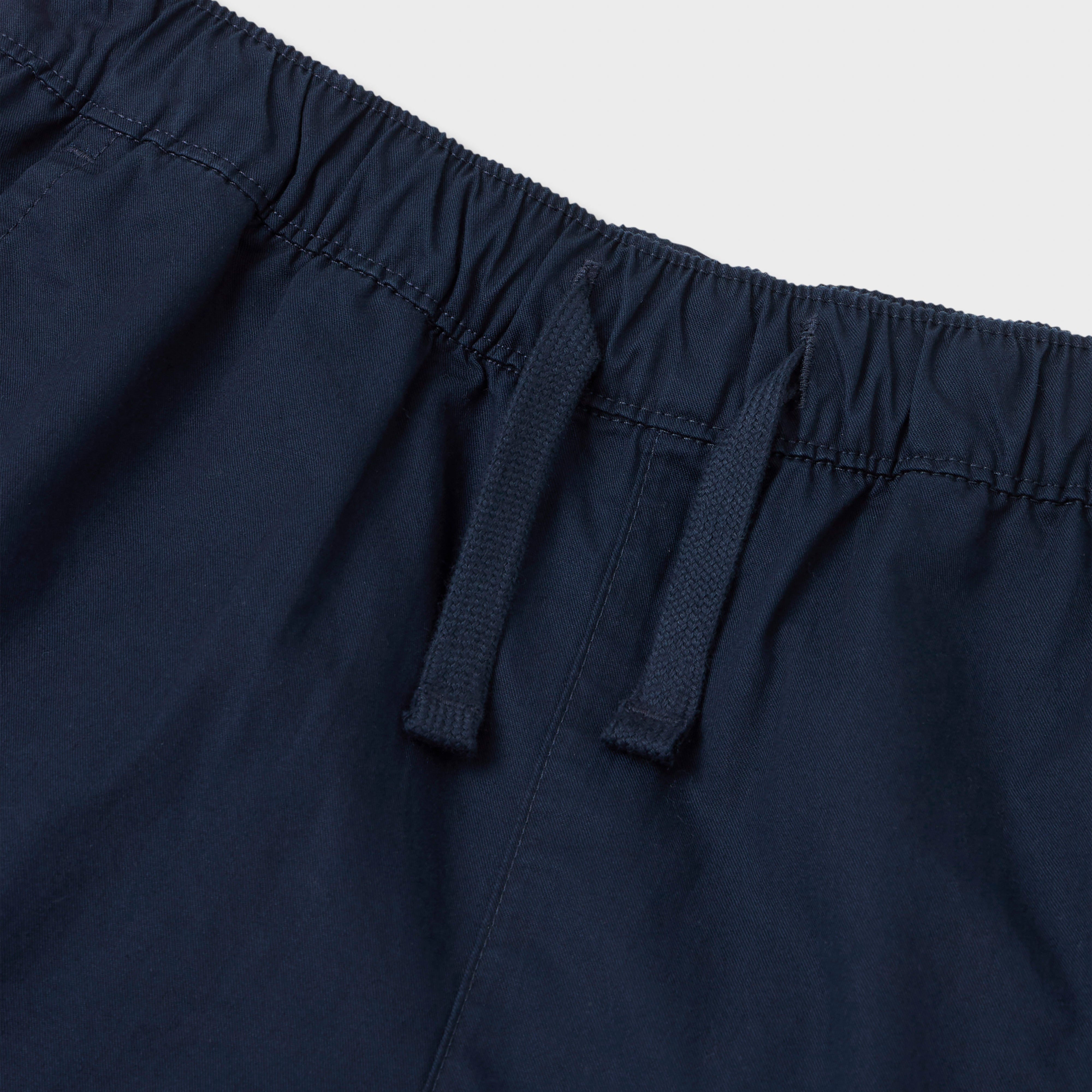 Moai Embroidered Woven Shorts