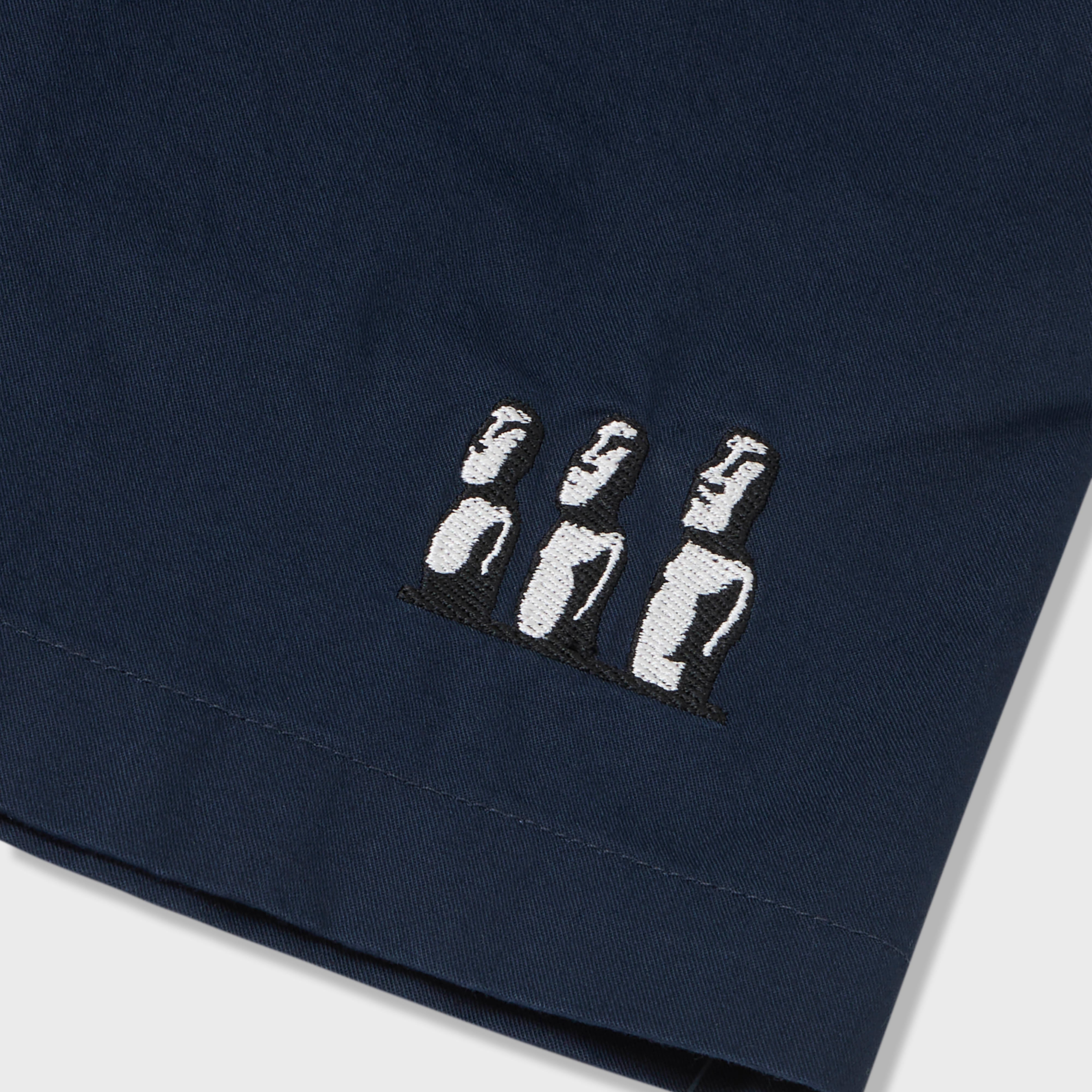 Moai Embroidered Woven Shorts
