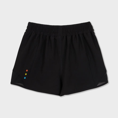 Black Grand Prismatic Spring girls mesh shorts with three rainbow dots on the leg, front view
