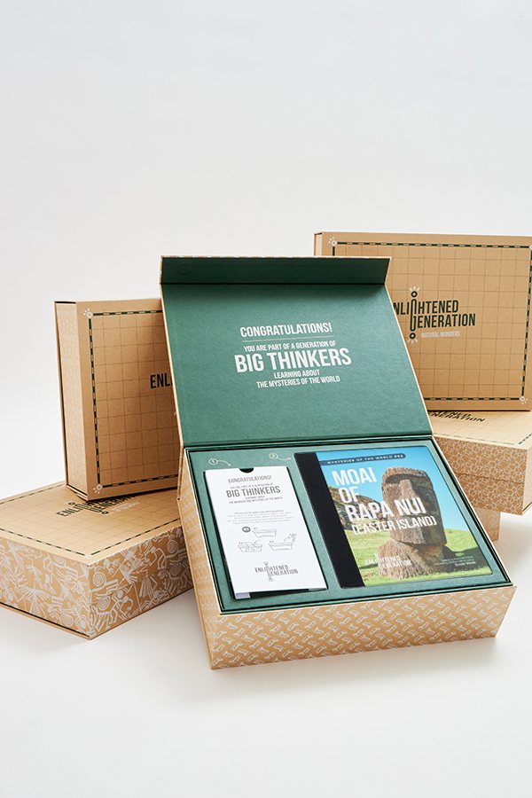 The open Moai of Rapa Nui keepsake box in front of stacked gift boxes
